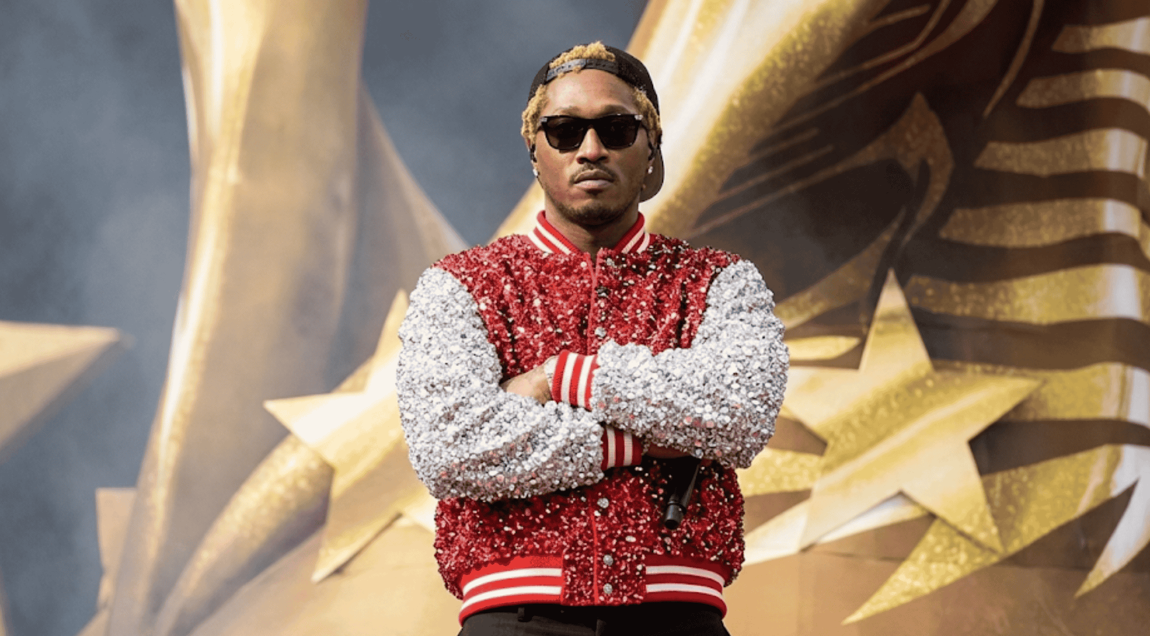 Future wearing Louis Vuitton red and silver crystal varsity jacket at FIFA World Cup 2026 opening ceremony